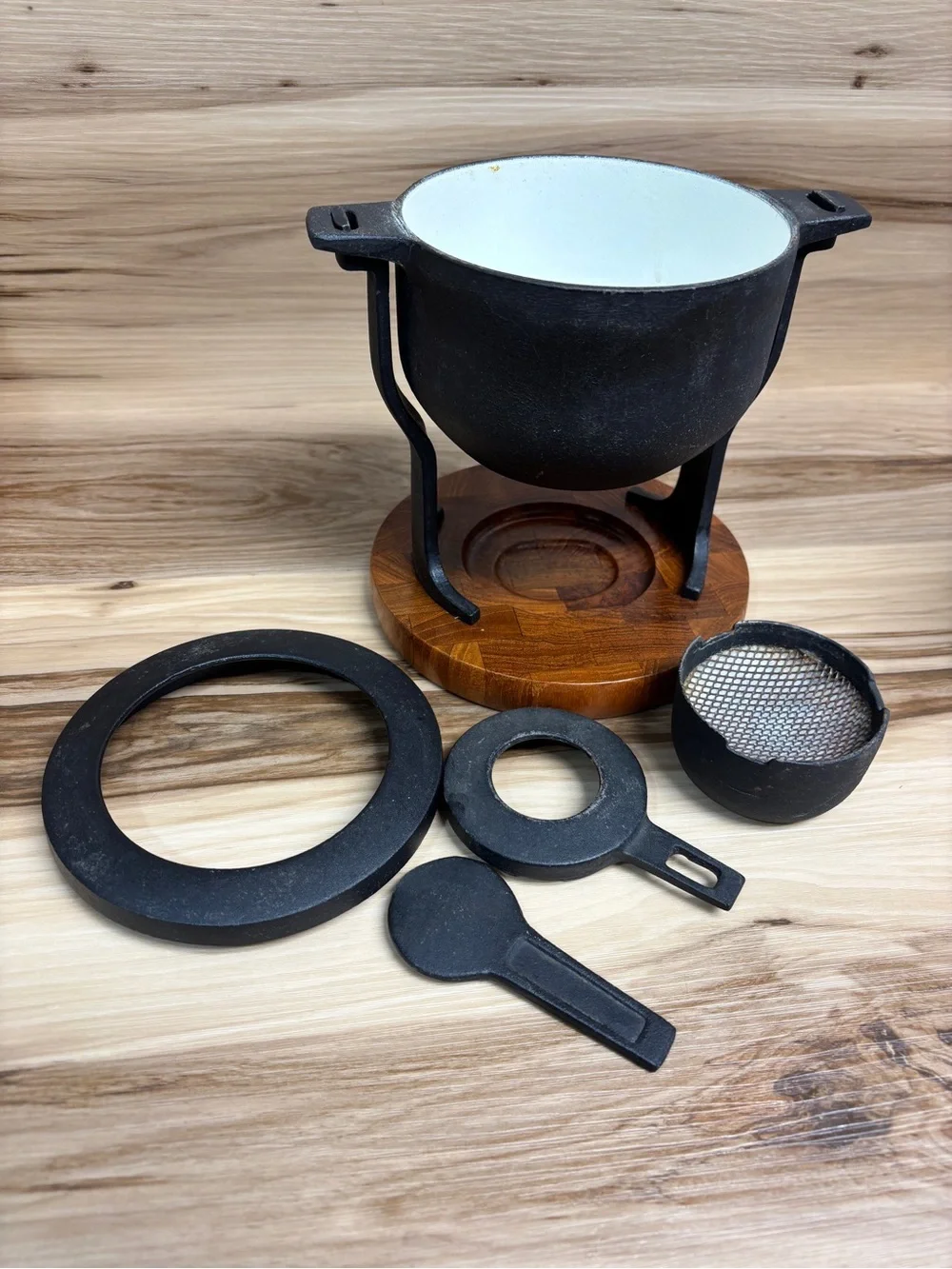 Digsmed Vintage mid-century modern cast iron and teak wood fondue pot.